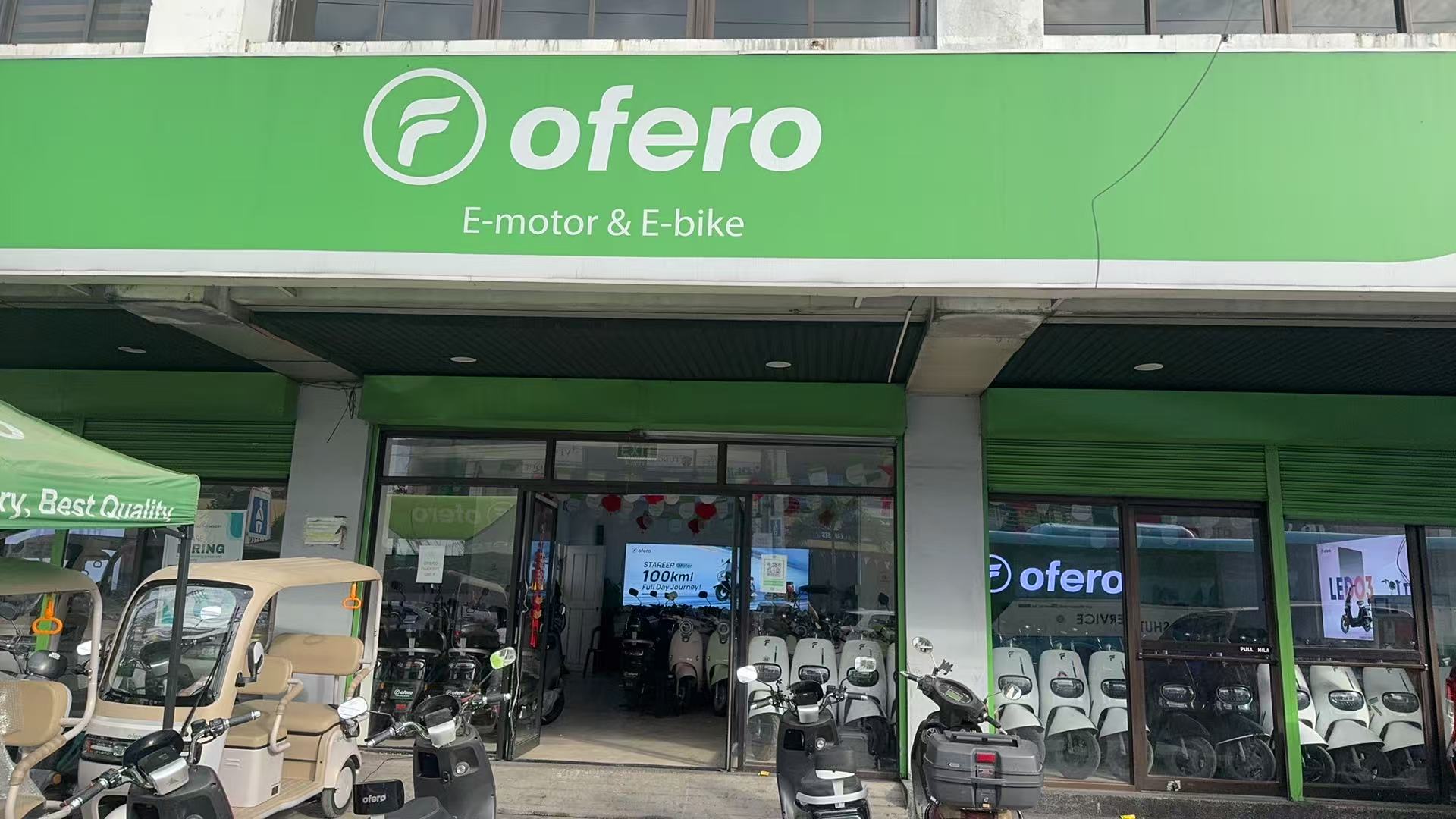 Green OFERO storefront and entrance at Imus